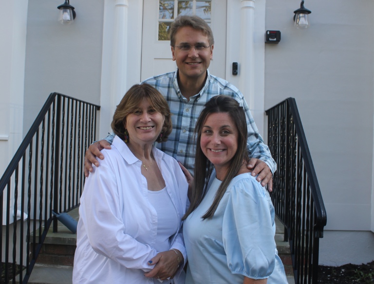 The Kubick & Kubick team posing on the office front porch